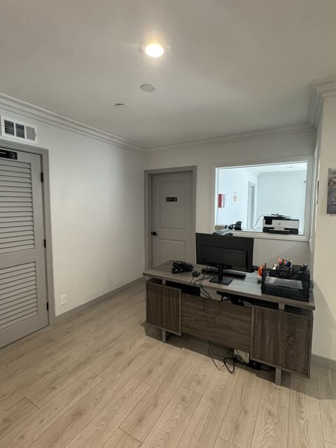 The care team's office workstation inside the home